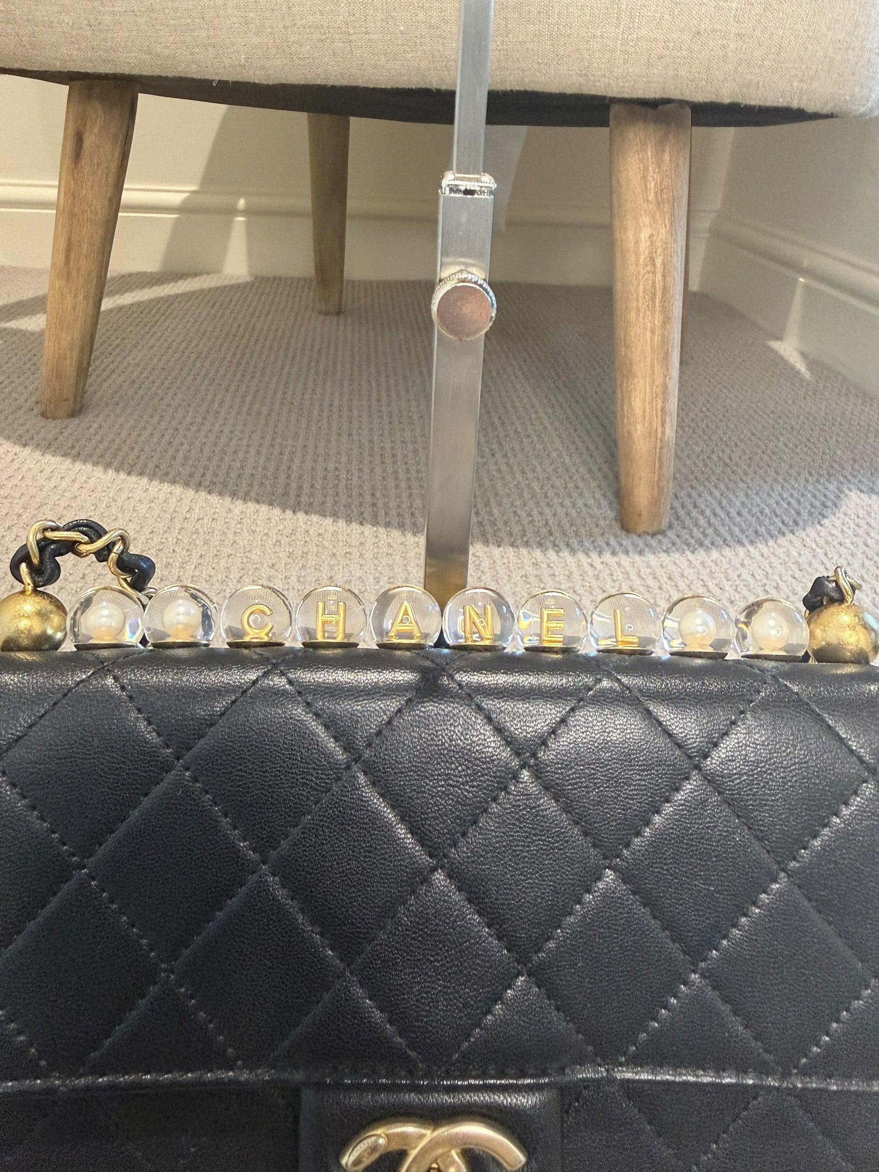 CHANEL Black Quilted Flap Bag — Rare Pearl & Gold Letter Bead Trim