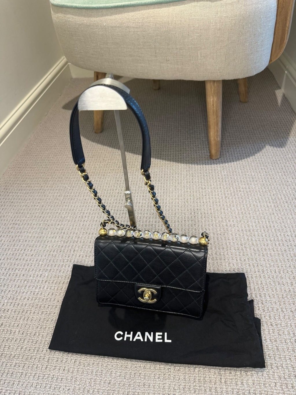 CHANEL Black Quilted Flap Bag — Rare Pearl & Gold Letter Bead Trim