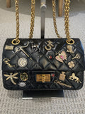 Chanel Lucky Charms 2.55 Reissue Double Flap Bag — Black Aged Calfskin, Gold Hardware, Limited Edition