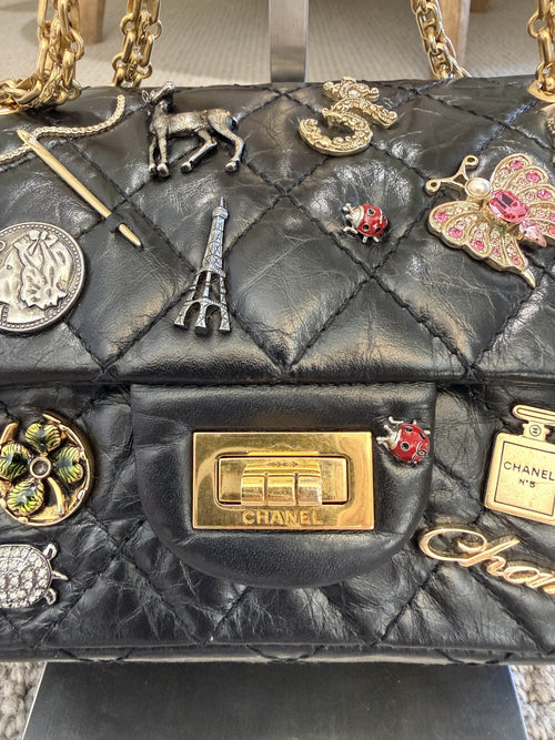 Chanel Lucky Charms 2.55 Reissue Double Flap Bag — Black Aged Calfskin, Gold Hardware, Limited Edition